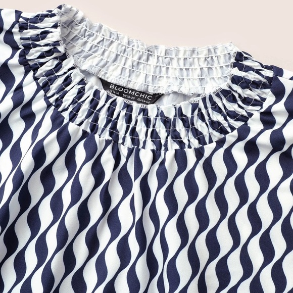 BloomChic Plus Size Geometric Mock Neck Shirred Ruffle Sleeve Blouse - Picture 6 of 10